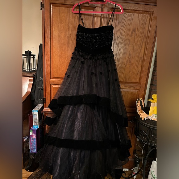 Stunning Mac Duggal Black Satin Gown with tiered skirt and stoned/beaded bodice.